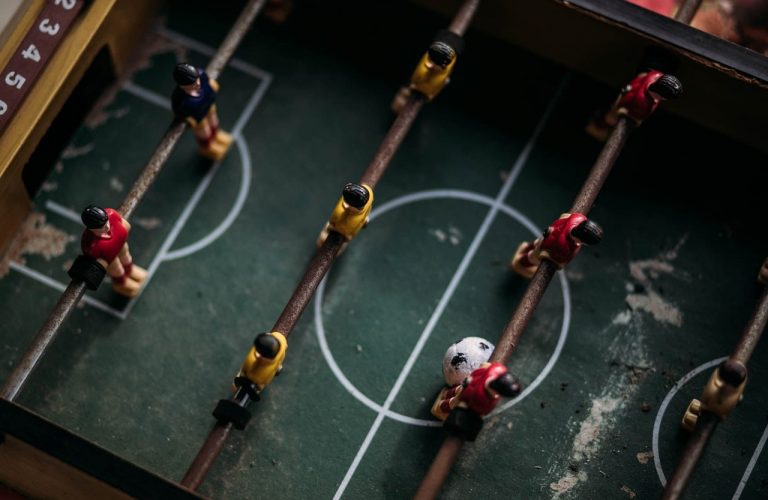 close-up-and-top-photography-of-football-table-2306898